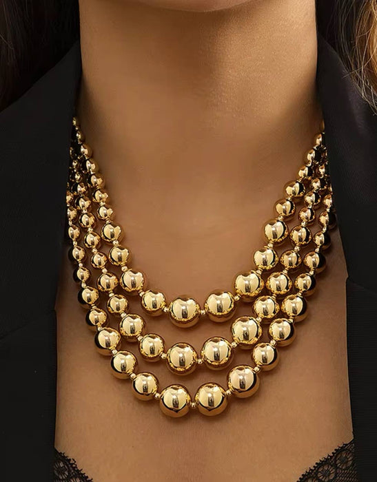 Gold Metal Beaded Triple Layer Necklace